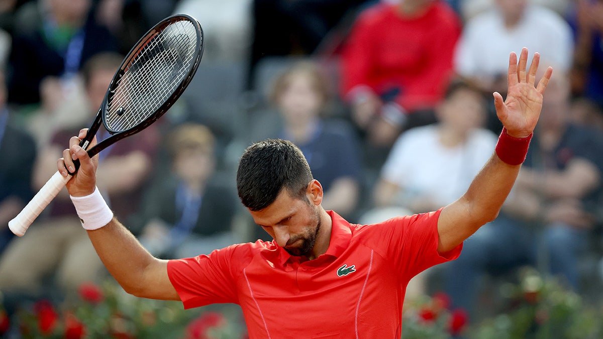 Novak Djokovic wears bicycle helmet to Italian Open training session after getting hit in the head with bottle