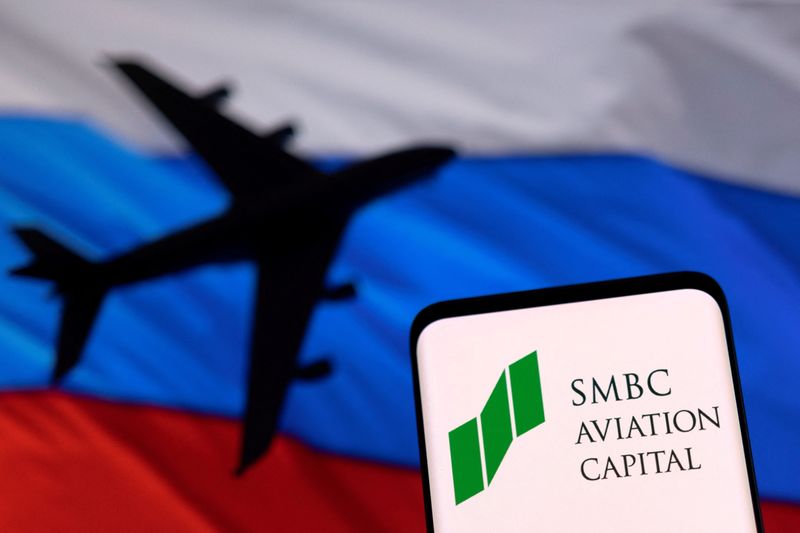 © Reuters. FILE PHOTO: SMBC Aviation Capital logo is seen displayed in front of the model of an airplane and a Russian flag in this illustration taken, May 4, 2022. REUTERS/Dado Ruvic/Illustration/File Photo CEO of lessor SMBC Aviation says almost every aircraft being delayed